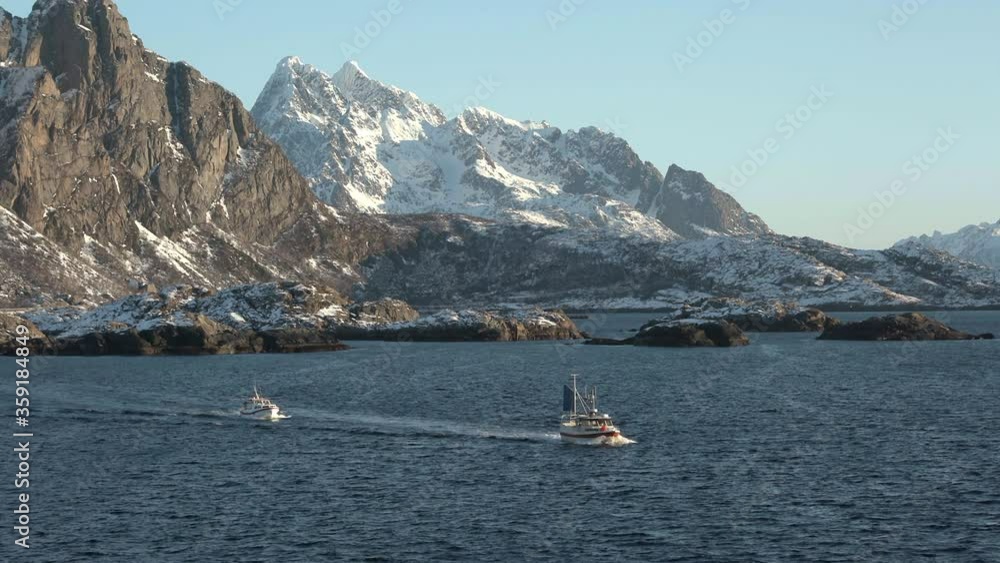 lofoten archipelago islands norway boat on fjord winter scenery lofoten archipelago islands norway boat on fjord winter scenery