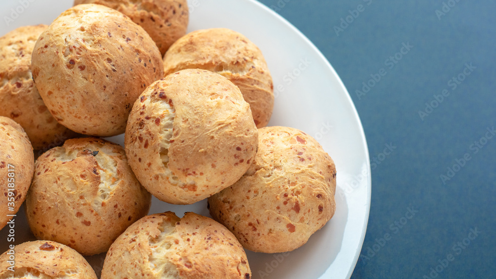 Fresh homemade cakes. Lush curd buns on a white plate Fresh homemade cakes. Lush curd buns on a white plate