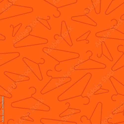 A seamless vector image with hangers. Clothes donation theme background. 