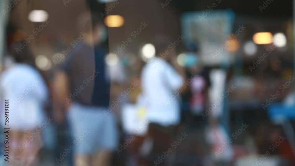 Blurry many people wearing mask and walking to shopping in the fresh market at Bangkok, Thailand. Slow motion video. Blurry many people wearing mask and walking to shopping in the fresh market at Bangkok, Thailand. Slow motion video.