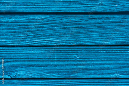 old boards painted with blue paint