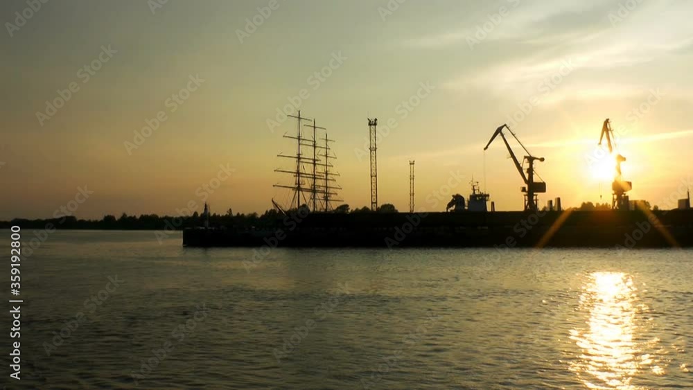 Russia, Saint Petersburg, June 19, 2020: cargo containers and Loading equipment in the port Harbor. Russia, Saint Petersburg, June 19, 2020: cargo containers and Loading equipment in the port Harbor.