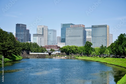 Moat and old Japanese gate in Tokyo.