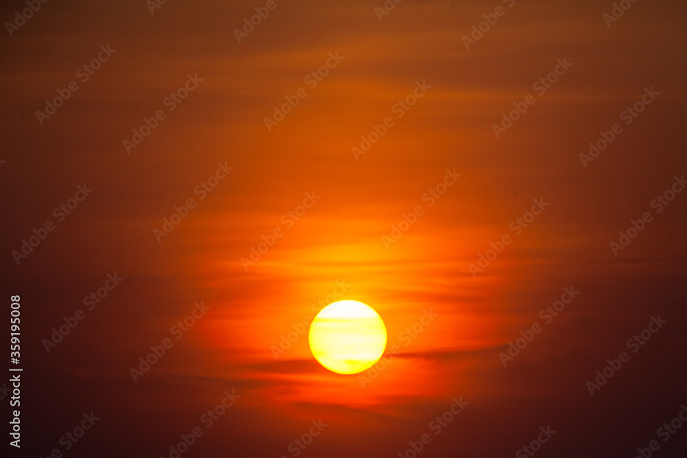 Horizontal view of a red sunset background.