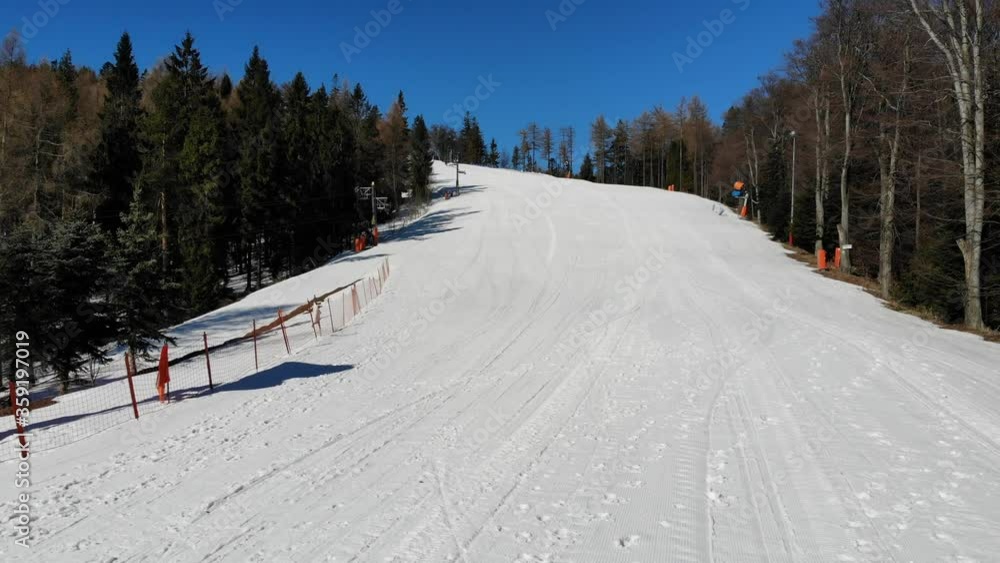 Ski piste in Jaworzyna Krynicka Mountain in winter. Krynica-Zdroj resort, Poland. Ski piste in Jaworzyna Krynicka Mountain in winter. Krynica-Zdroj resort, Poland.
