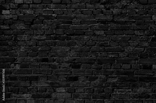 Old Dirty Blsck and Dark Brick Wall. Fragment Of Brick Wall Of Old Building Close-up.