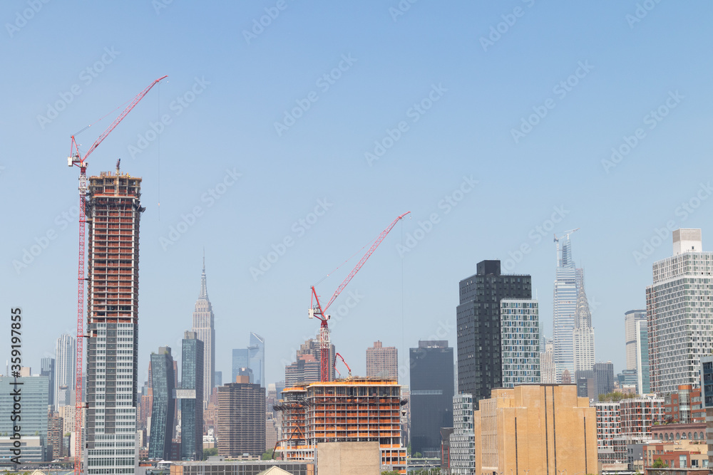 Skyscraper Construction in Long Island City Queens New York with the Manhattan Skyline in the Background