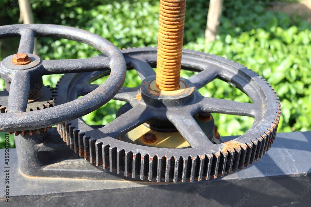 Cogs control the water gates valve to opening and closing for prevent flood. Cogs control the water gates valve to opening and closing for prevent flood.