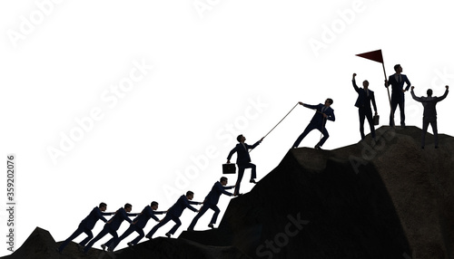 Concept of teamwork with team climbing mountain top