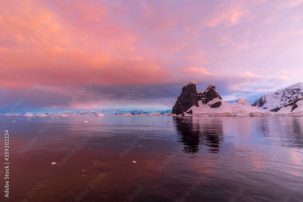 Beautiful sunset in Antarctica at the Lemire Channel