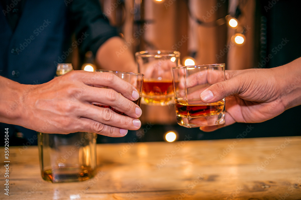 Celebrate whiskey on a friendly party in restaurant Celebrate whiskey on a friendly party in restaurant