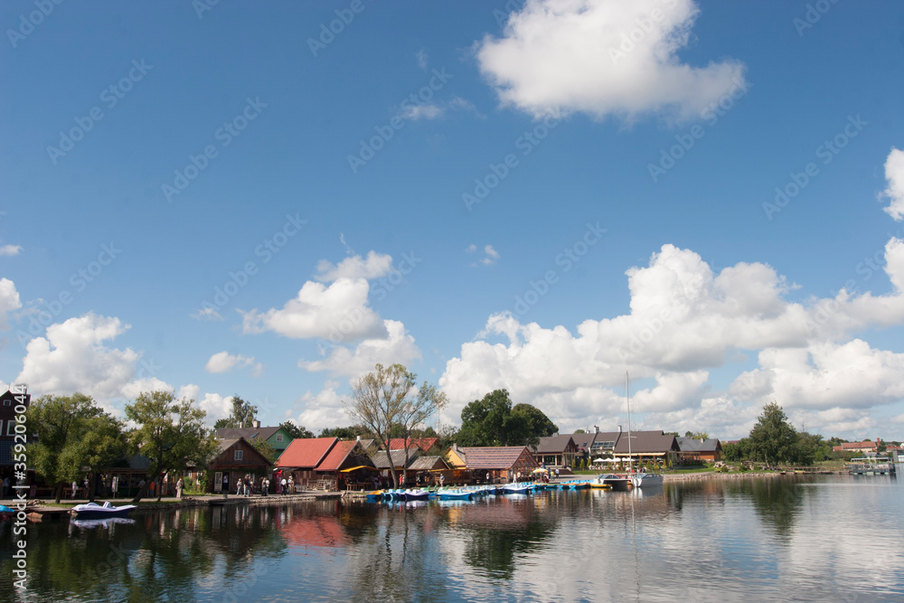 Fototapeta premium Shops and other buildings on the edge of the lake in Trakai, Lithuania
