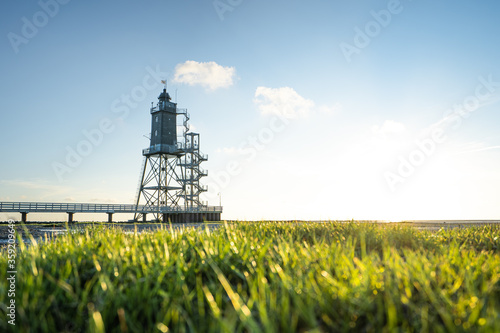 Leuchtturm Obereversand an der Nordseeküste photo