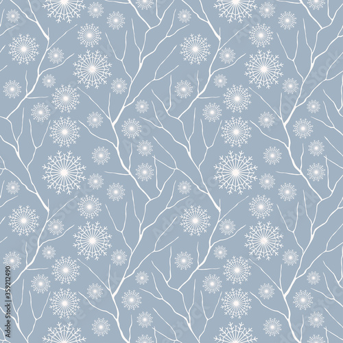 Winter seamless pattern. Snowflakes, tree branches. Background texture. Wallpaper