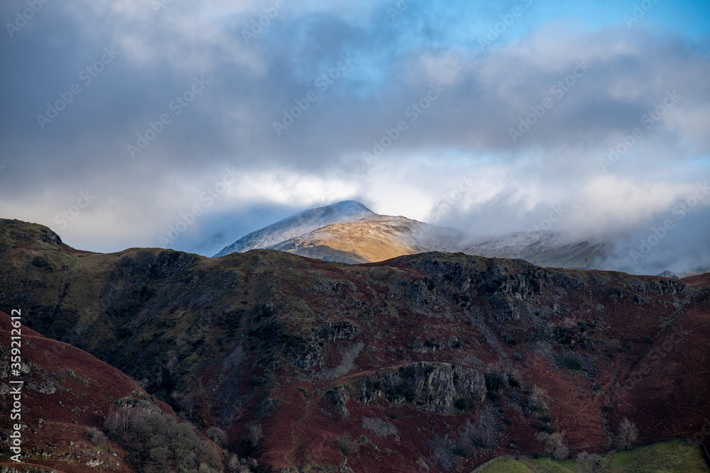View of mountains and fells around the Langdale Valley, English Lake district, Cumbria in the winter View of mountains and fells around the Langdale Valley, English Lake district, Cumbria in the winter