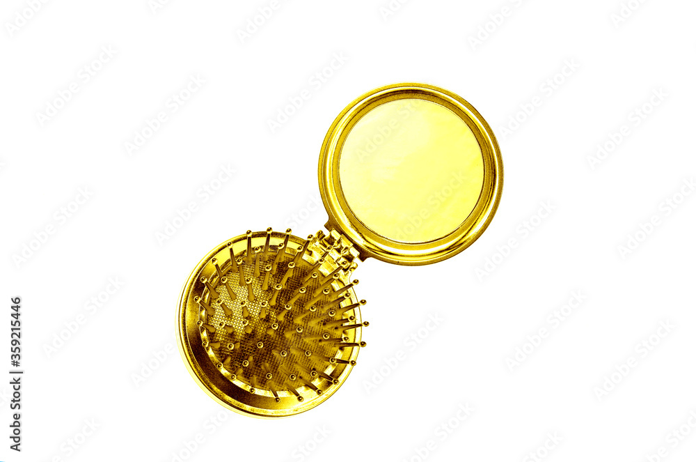 Mini golden mirror-comb isolated on white background Mini golden mirror-comb isolated on white background