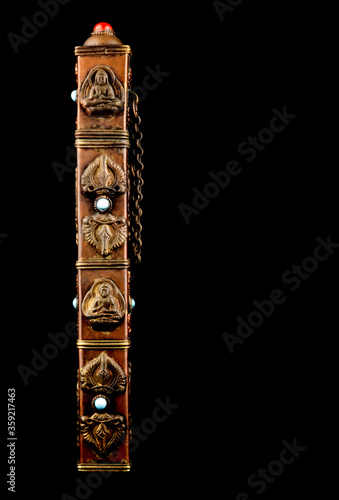 Obraz na płótnie Buddhist Incense Holder Isolated on a Black Background