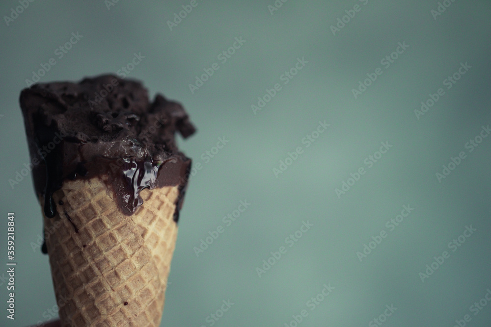 Bite of ice cream chocolate wafer in hand. Bite of ice cream chocolate wafer in hand.