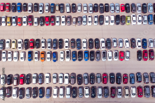 Used car parking, top view of a trade in car parking. Bird's eye view of a crowded parking lot