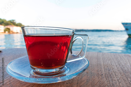 Turkish tea on the table on the background of the Bosphorus.