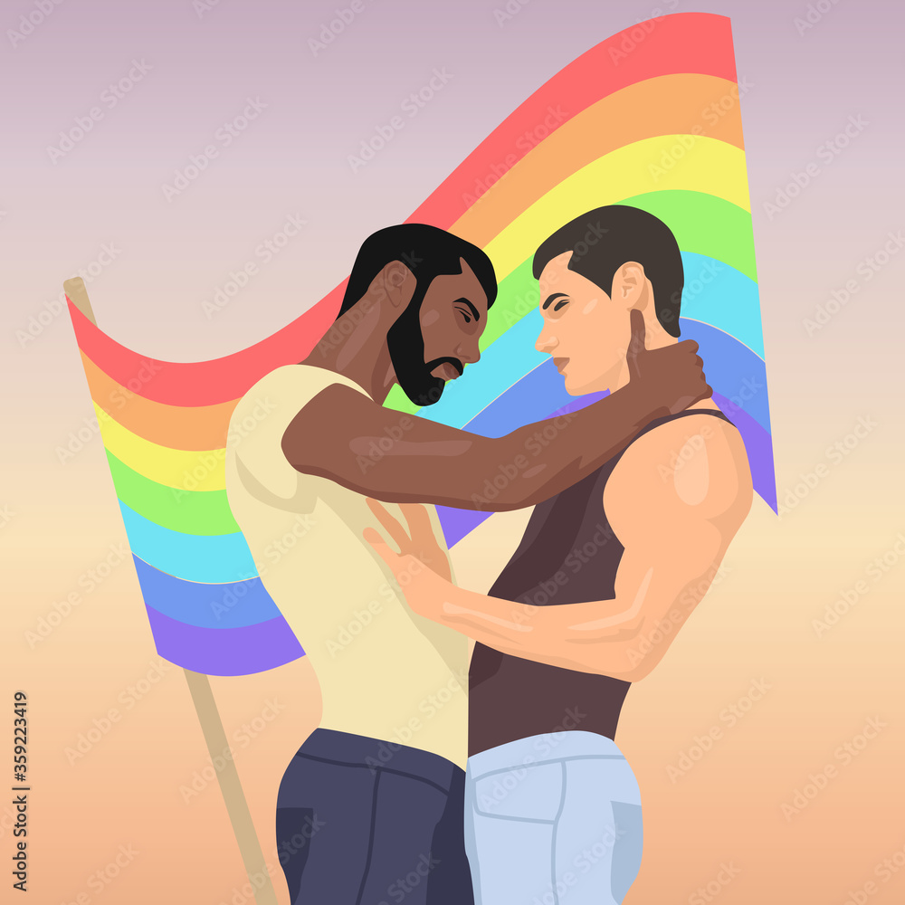 Two gay men hug against the background of a rainbow flag Two gay men hug against the background of a rainbow flag