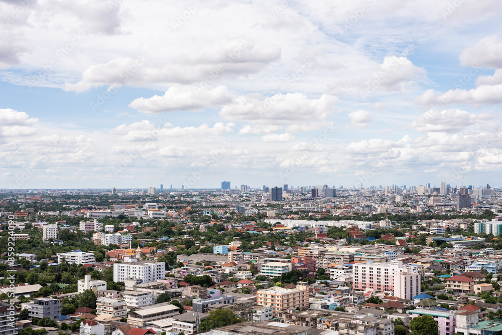 The Bangkok cityscape from skyscraper view with clouds and blue sky. The Bangkok cityscape from skyscraper view with clouds and blue sky.