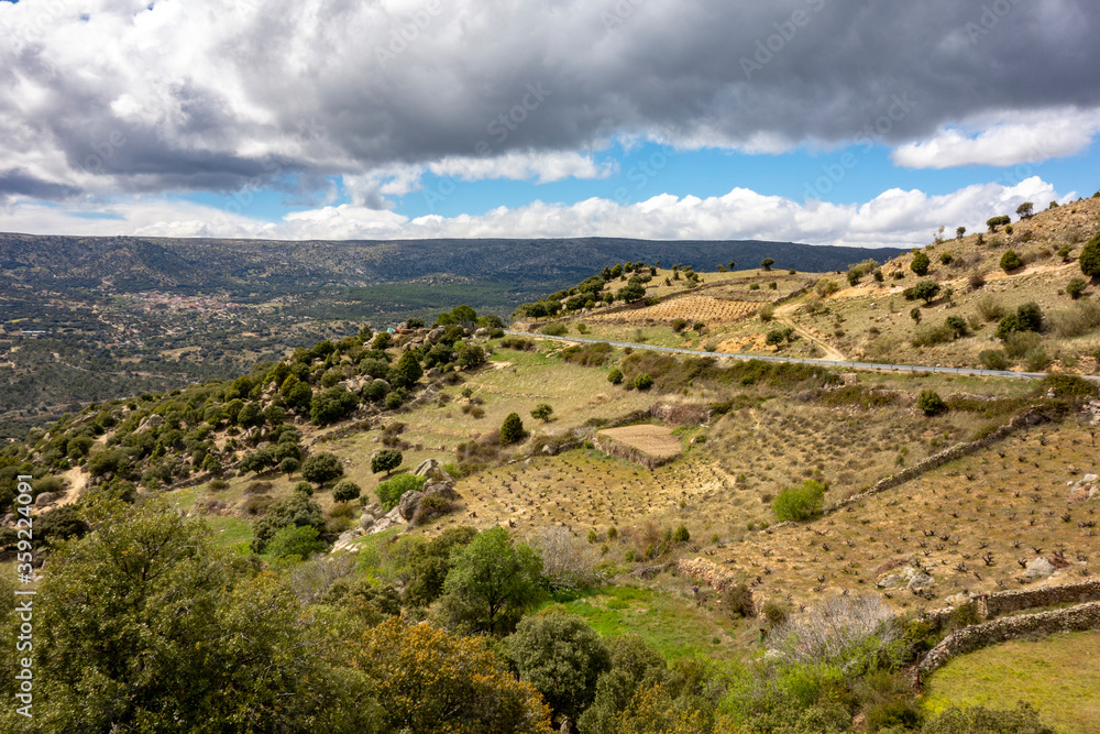 Landscape with far view of mountains on Saint James way, Camino de Levante from Toledo to Avila, Spain
