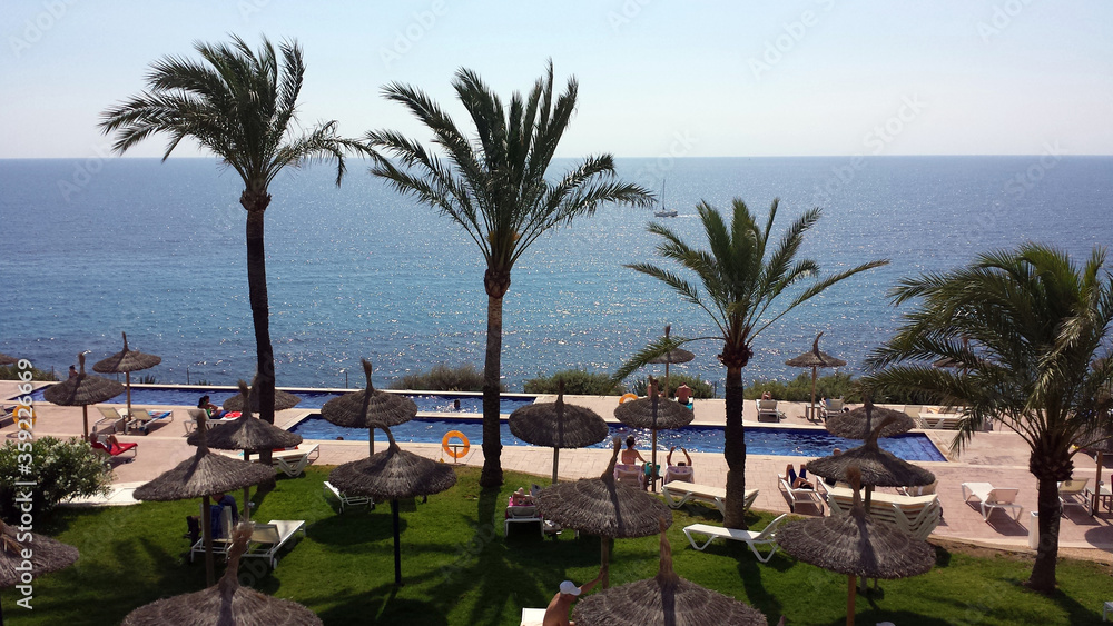 Fototapeta premium Rest in a resort on the coast of Majorca, Spain