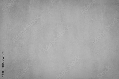 Texture of gray concrete wall surface. Some crack and scratch, suitable for use as a pattern or  background image.