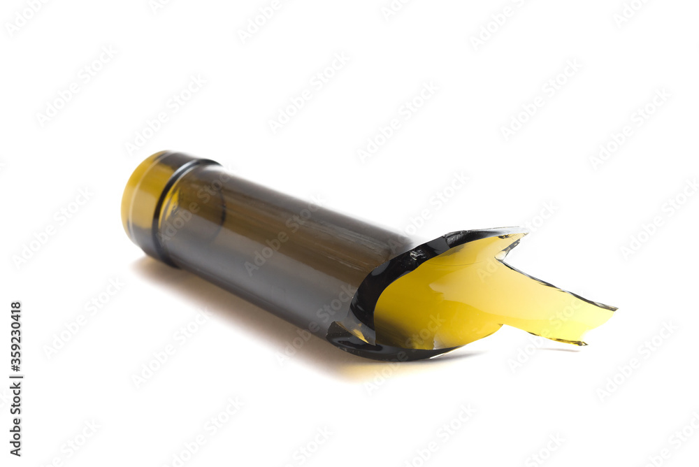 Shattered wine bottle. Parts of the broken bottle glass isolated on white background. Pieces of sharp broken glass. Concept of danger. Shattered wine bottle. Parts of the broken bottle glass isolated on white background. Pieces of sharp broken glass. Concept of danger.