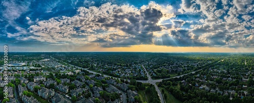 Billede på lærred Aerial View of Dramatic Sunrise Over Neighborhoods of Mid Western City of Lexing