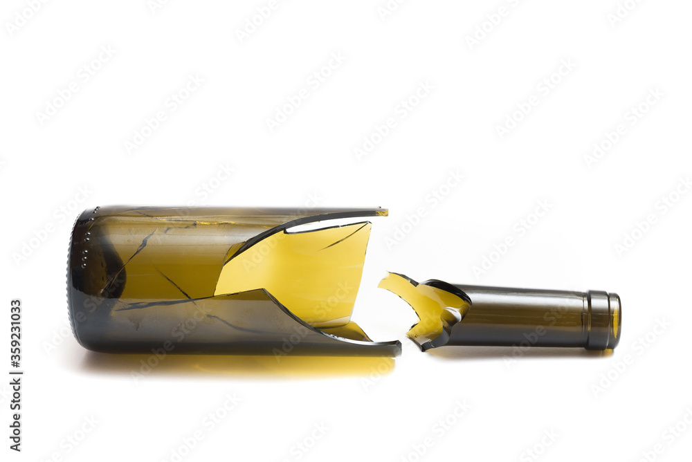 Shattered wine bottle. Parts of the broken bottle glass isolated on white background. Pieces of sharp broken glass. Concept of danger. Shattered wine bottle. Parts of the broken bottle glass isolated on white background. Pieces of sharp broken glass. Concept of danger.