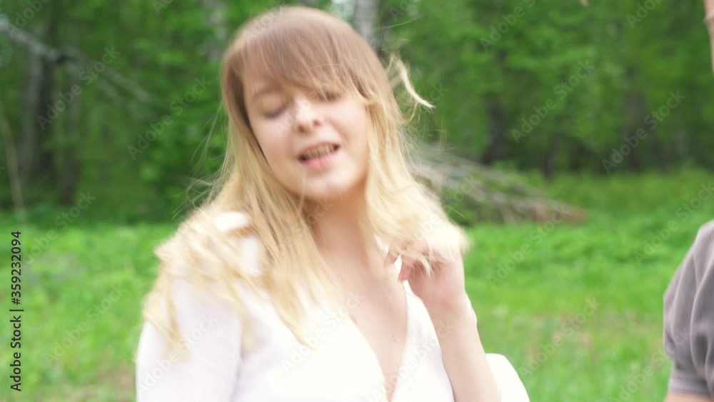Happy Carefree Beautiful Young Woman Dancing And Singing In Summer Outdoor Party in Nature. Girl Dance Celebration Holiday. Girlfriends Friends Partying Leisure Activity. Countryside Vacation. Happy Carefree Beautiful Young Woman Dancing And Singing In Summer Outdoor Party in Nature. Girl Dance Celebration Holiday. Girlfriends Friends Partying Leisure Activity. Countryside Vacation.