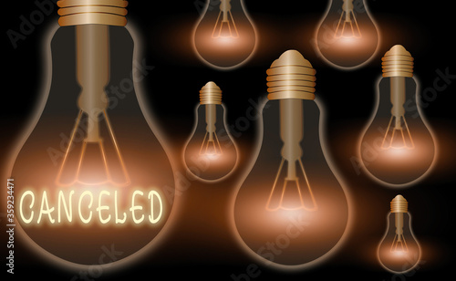 Writing note showing Canceled. Business concept for to decide not to conduct or perform something planned or expected Realistic colored vintage light bulbs, idea sign solution photo