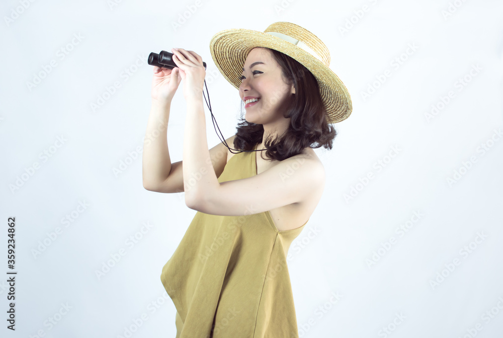 Asian woman holding binoculars for travelling on summer trip Asian woman holding binoculars for travelling on summer trip