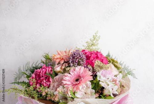 beautiful bouquet of gerbera, hydrangea, rose, alstroemeria flowers on a white background. Stylish floristic composition. greeting card concept.