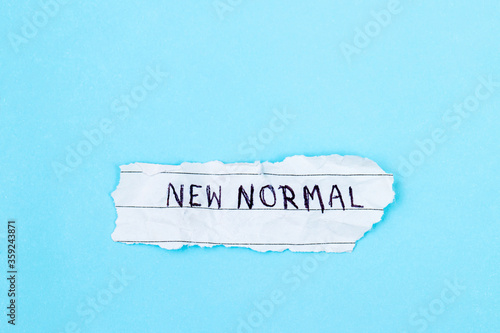 Conceptual hand writing showing Time For A New Normal on blue background .