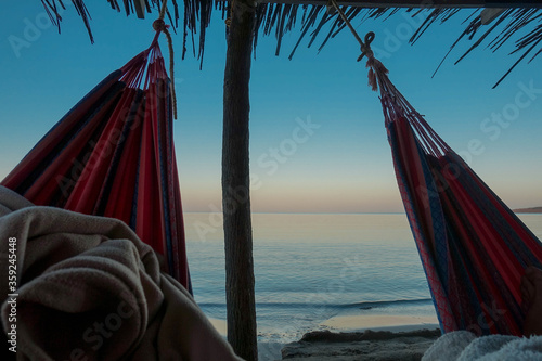 Sleeping in a hammock on Wayuu beach at Cabo de la vela, La guajira, Colombia 