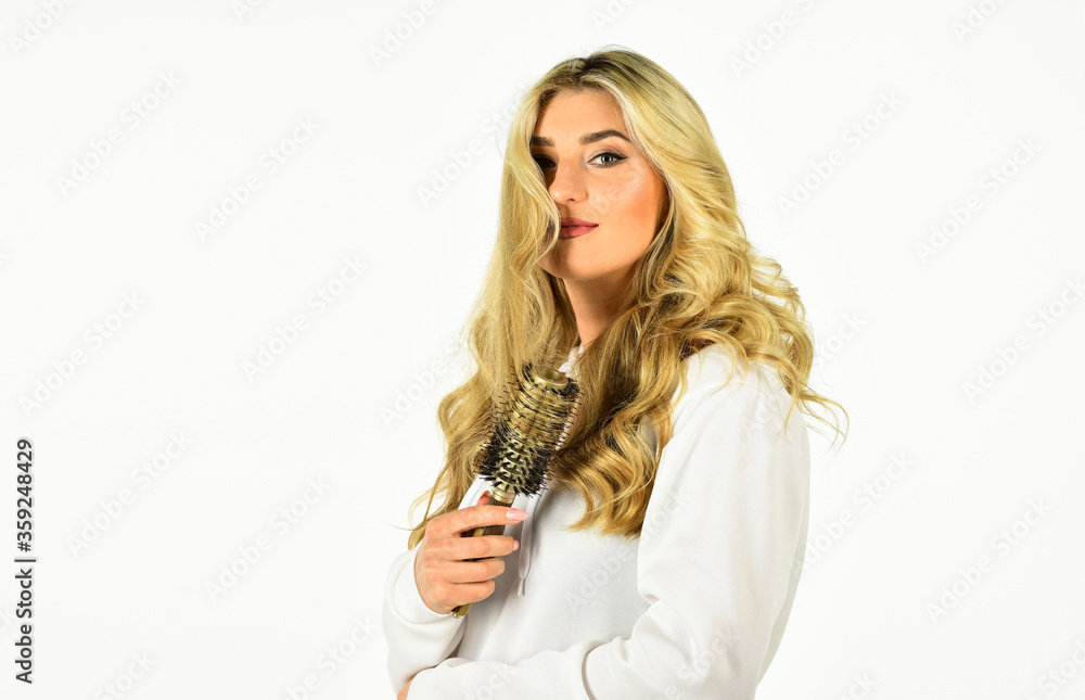 Professional equipment. Easy hairdo. Beauty supplies. Bristles perfectly untangle curly hair. Hot curling brush. Pretty woman brushing hair isolated on white. Long hair. Hair care. Hairdresser salon Professional equipment. Easy hairdo. Beauty supplies. Bristles perfectly untangle curly hair. Hot curling brush. Pretty woman brushing hair isolated on white. Long hair. Hair care. Hairdresser salon