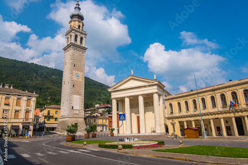 Valdobbiadene, Italy - August 11, 2019: Town Hall and Santa Maria Assunta Cathedral in Piazza Guglielmo Marconi of Valdobbiadene town,Treviso province