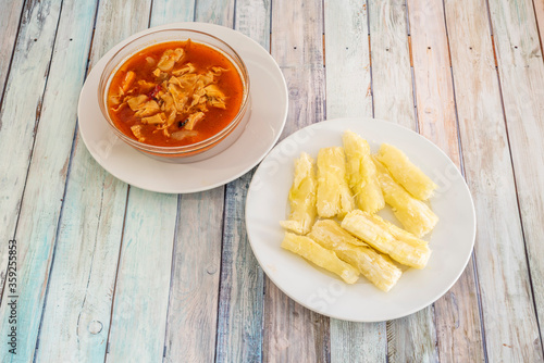 Typical Dominican dish of mondongo with yucca photo