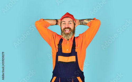 foreman wear boilersuit. Laborer man in working clothes. builder in working overalls. Engineer and industrial building. Repair advertisement. Builder or plasterer. mature repairman in uniform