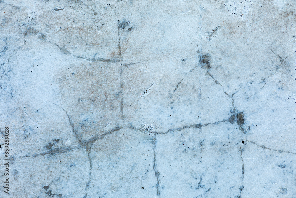 Detailed surface patterns and textures of grey concrete wall close up. Grunge background with copy space. Detailed surface patterns and textures of grey concrete wall close up. Grunge background with copy space.