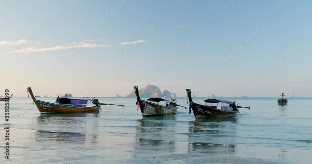 Traditional Thai long-tail boat at sunrise Traditional Thai long-tail boat at sunrise