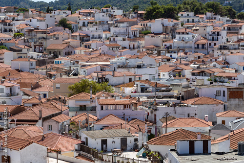 Obraz na płótnie Panorama view over Skiathos town and its port, Skiathos island, Sporades, Greece. Island is a popular tourist destination for both local and foreign tourists. w salonie