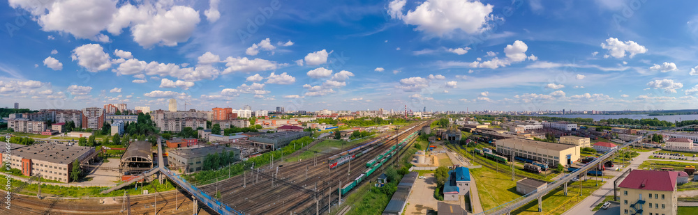 Fototapeta premium aerial view on sorting station Yekaterinburg, Ural Russia on the outskirts of the city. Views of the skyscrapers and infrastructure of big station