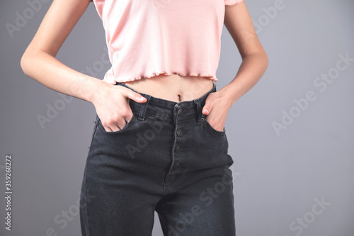 woman hand jeans pocket