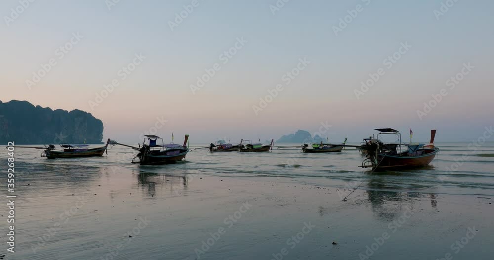 Traditional Thai long-tail boat at sunrise Traditional Thai long-tail boat at sunrise