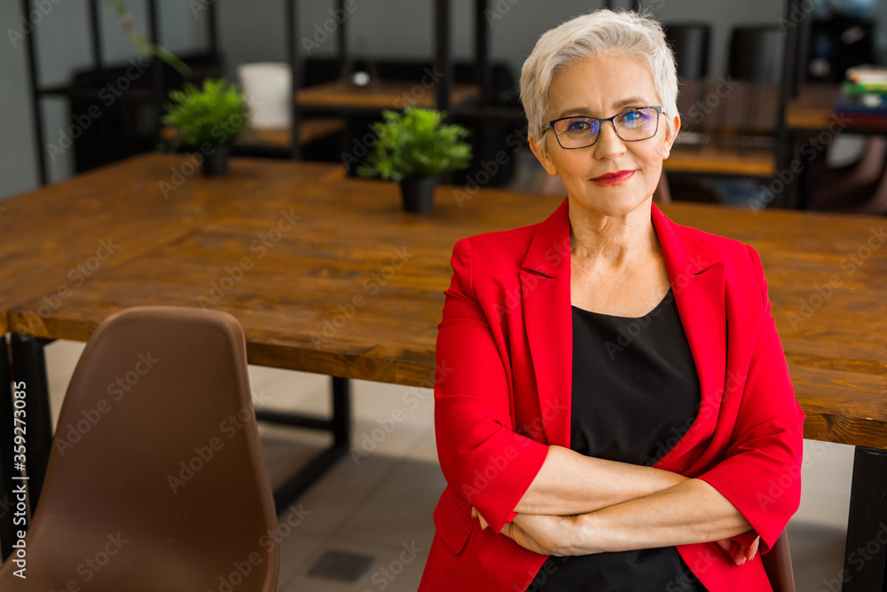 beautiful stylish aged woman in a red jacket beautiful stylish aged woman in a red jacket