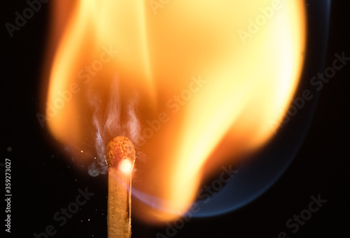 Flash of flame on a match. Close-up. Macro photography.